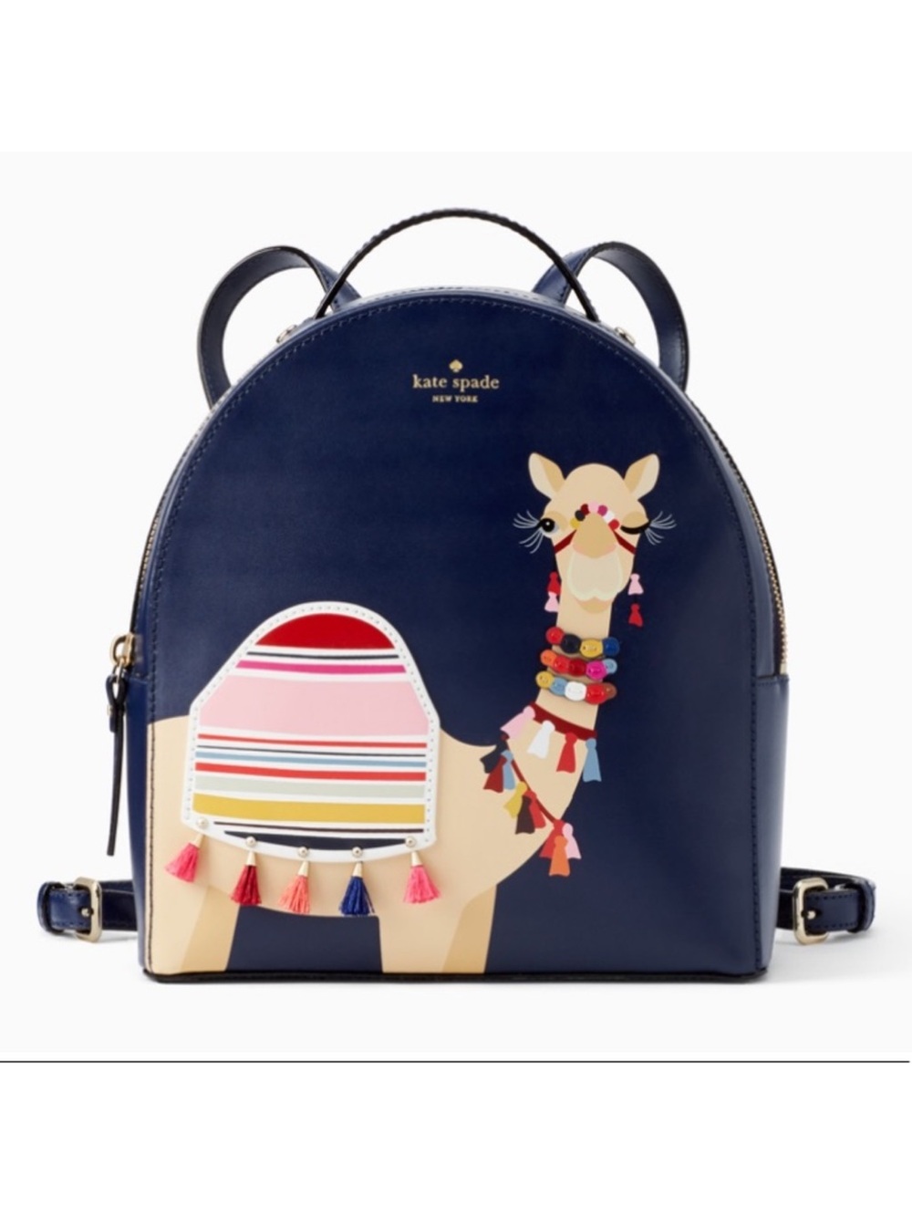 kate spade navy backpack with beige camel appliqué and multicolor tassels